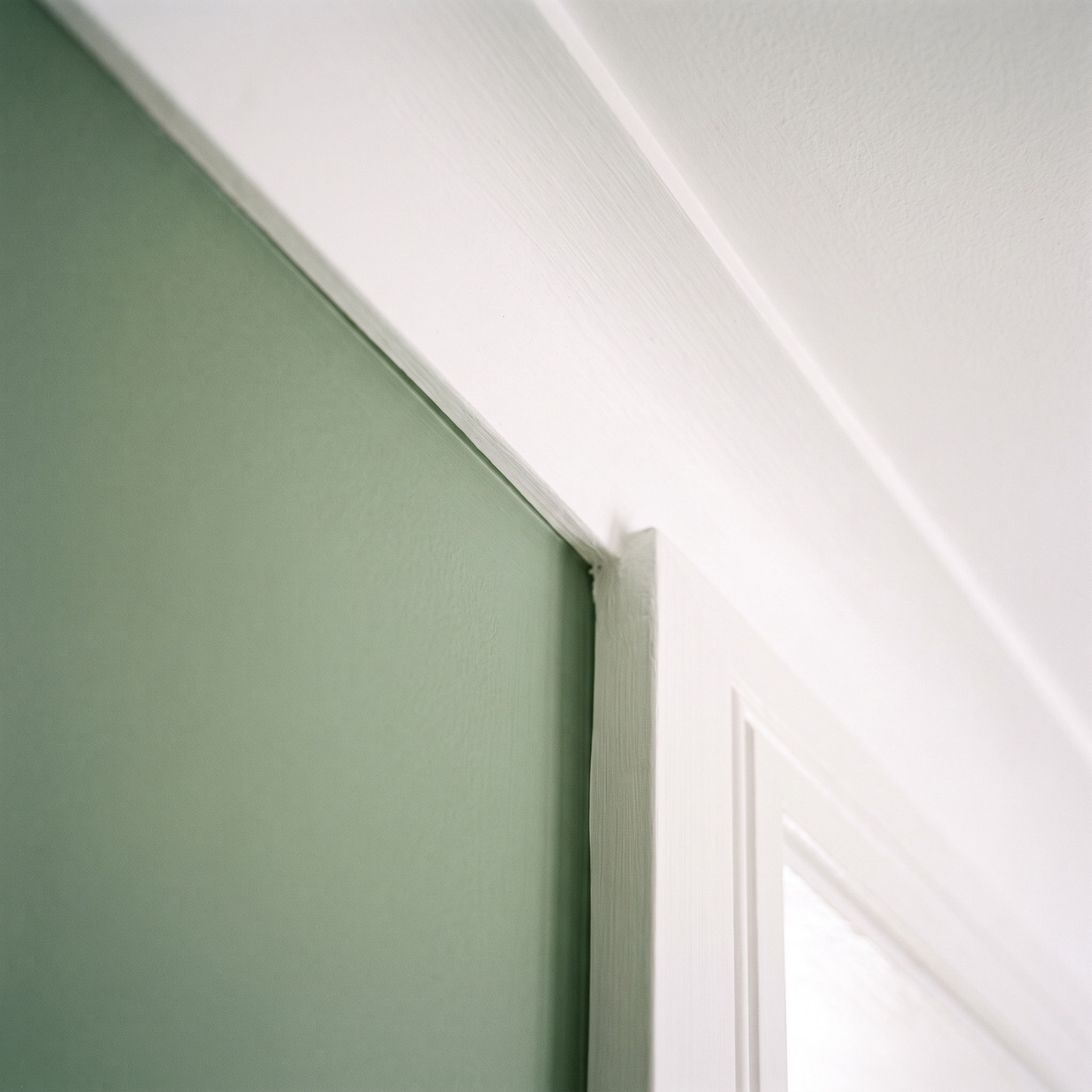 A crisp painted edge where wall meets trim