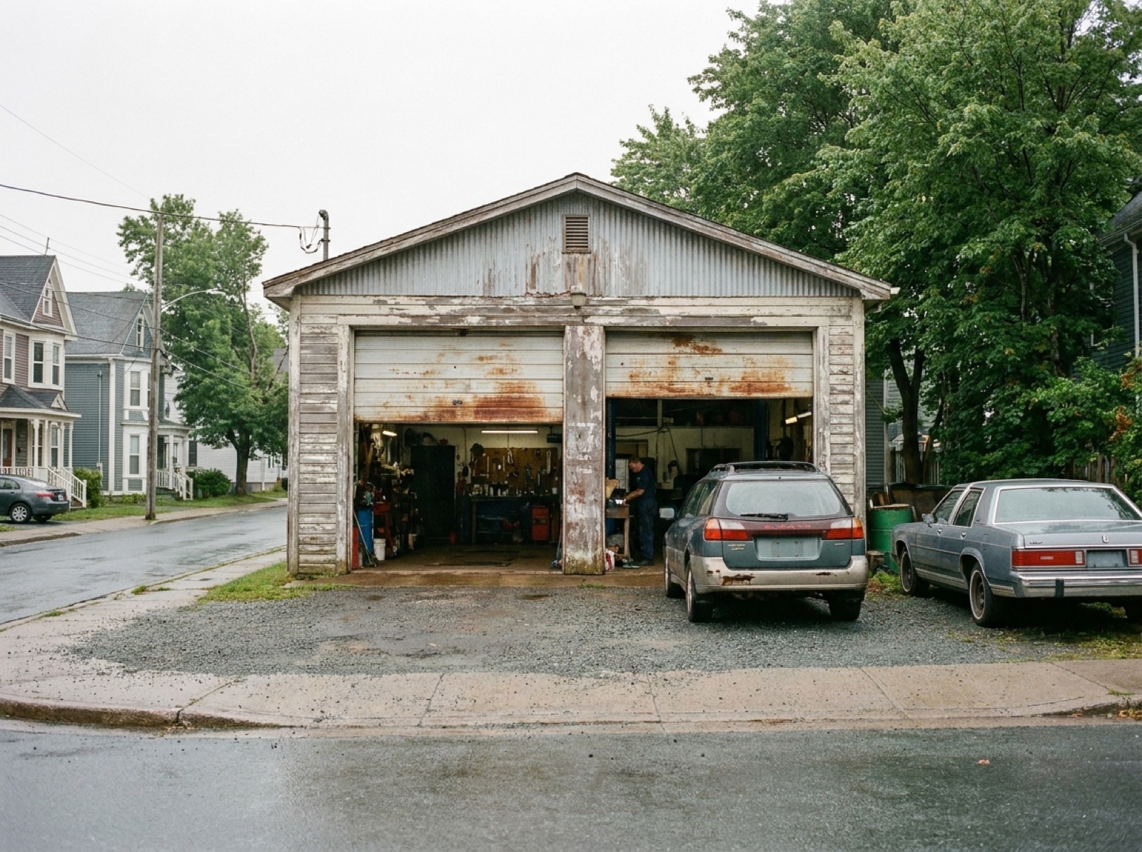 Tom McDonnell's Service Center garage on Clifton Street with the bay doors open