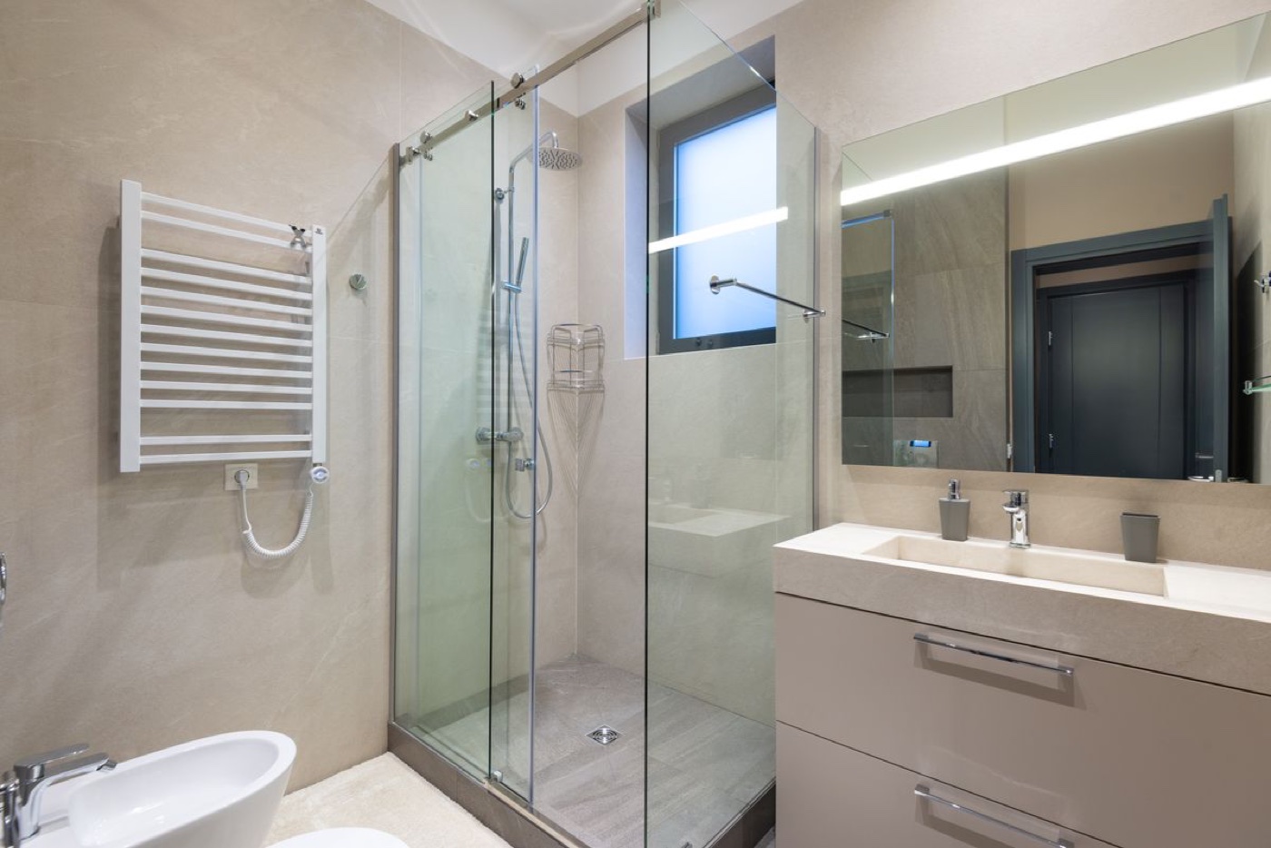 A clean modern bathroom with new toilet and sink